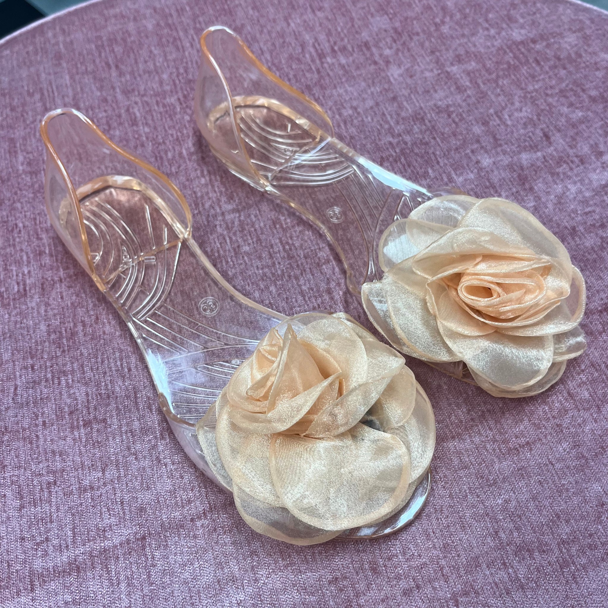 Peach Colored Transparent Flats with a Flower