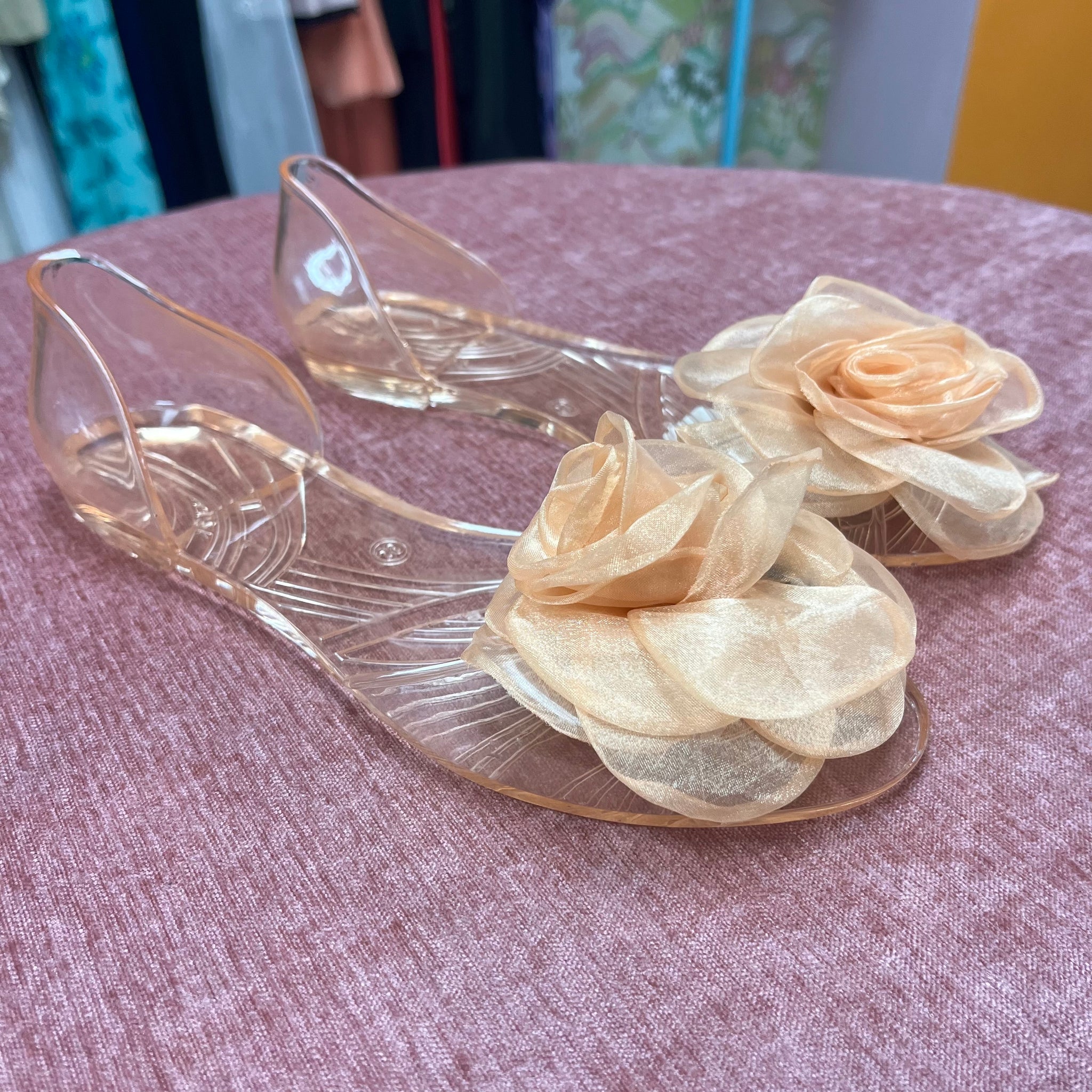 Peach Colored Transparent Flats with a Flower