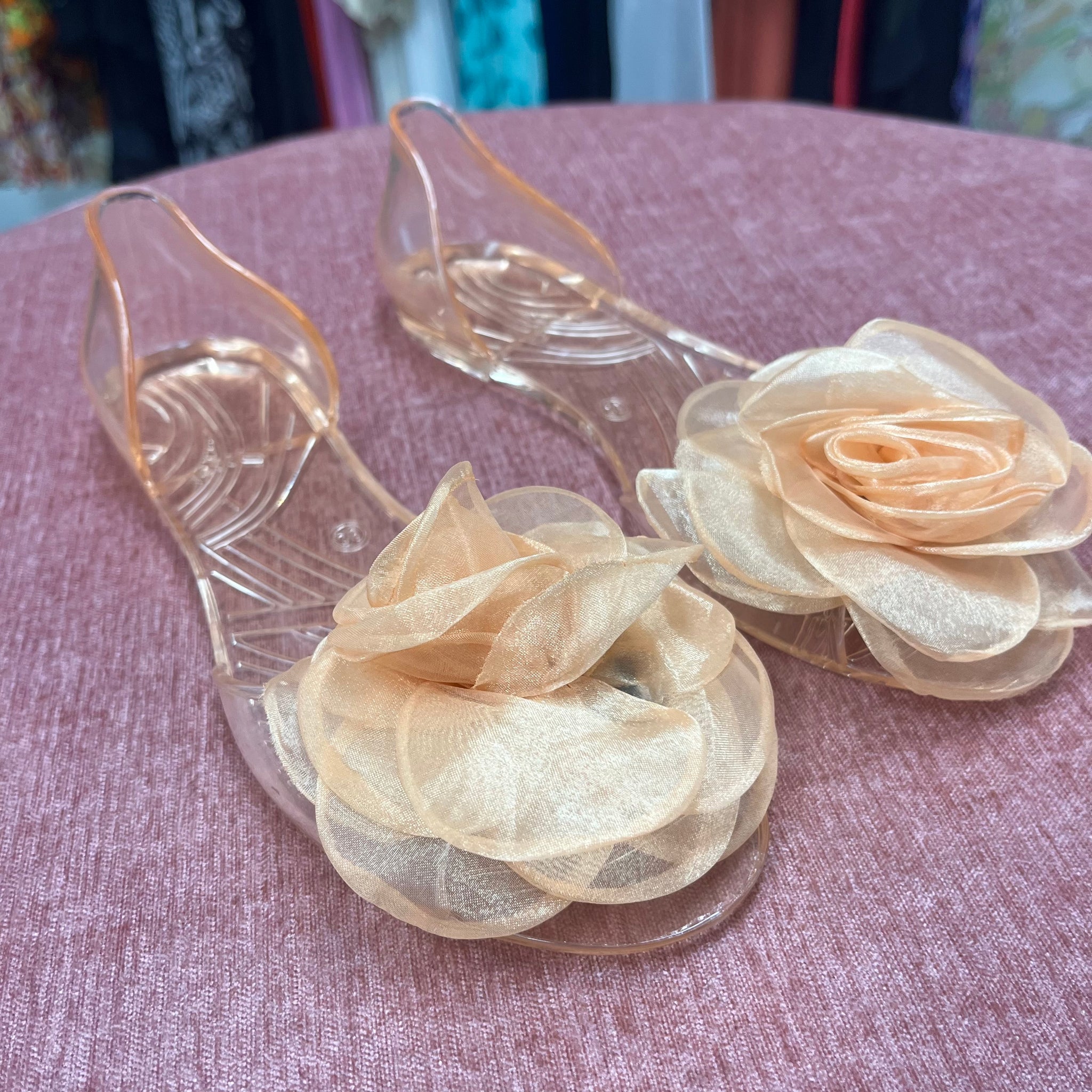 Peach Colored Transparent Flats with a Flower